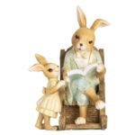 Figurina Tata iepuras citind puiului sau